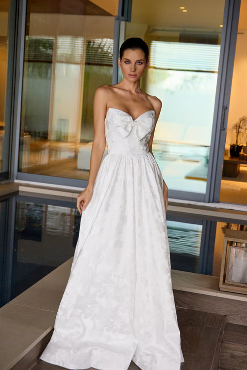Juliet 2700A White Strapless Bow Ball Gown with A-Line Skirt and Sweetheart Neckline