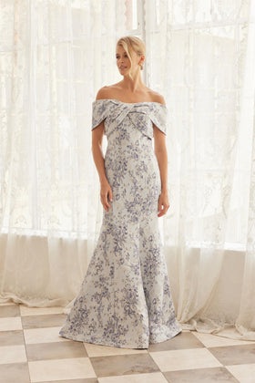 Off-Shoulder Twisted Front Trumpet Gown with Floral Brocade and Sweeping Train by Nox Anabel MT154
