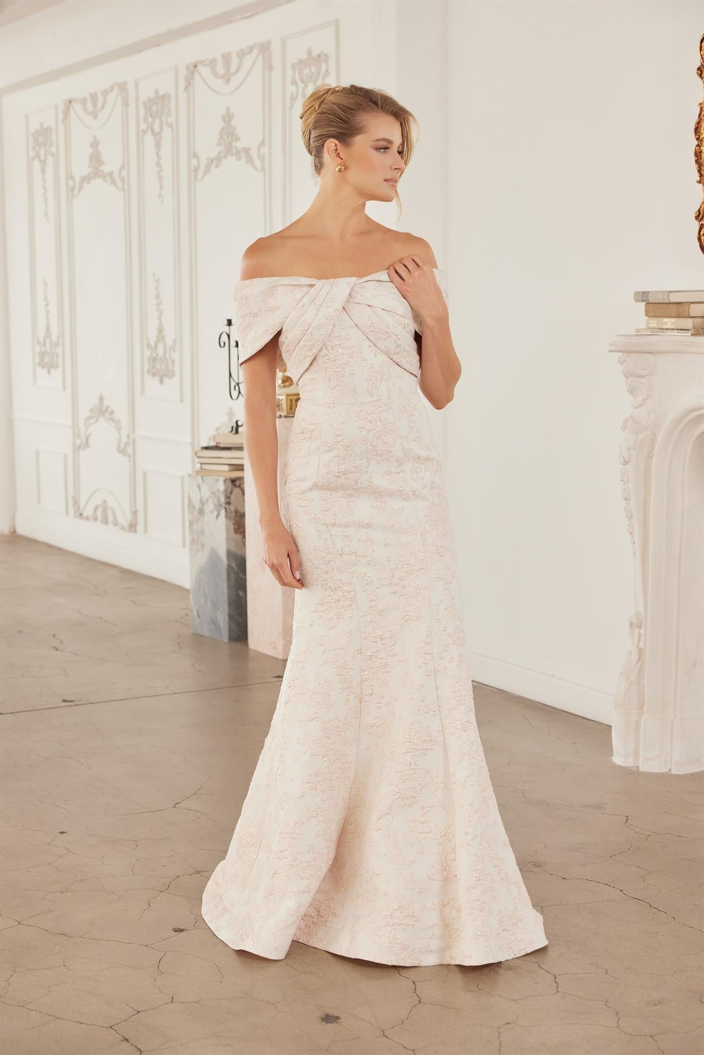 Off-Shoulder Twisted Front Trumpet Gown with Floral Brocade and Sweeping Train by Nox Anabel MT154
