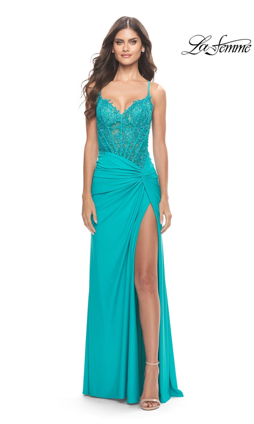 Woman in a turquoise Sheer-Bodice Long Prom Dress (La Femme 31447) with embroidered lace bodice, thin straps, open back, high slit, and ruched skirt; white background with "La Femme" logo at top right.