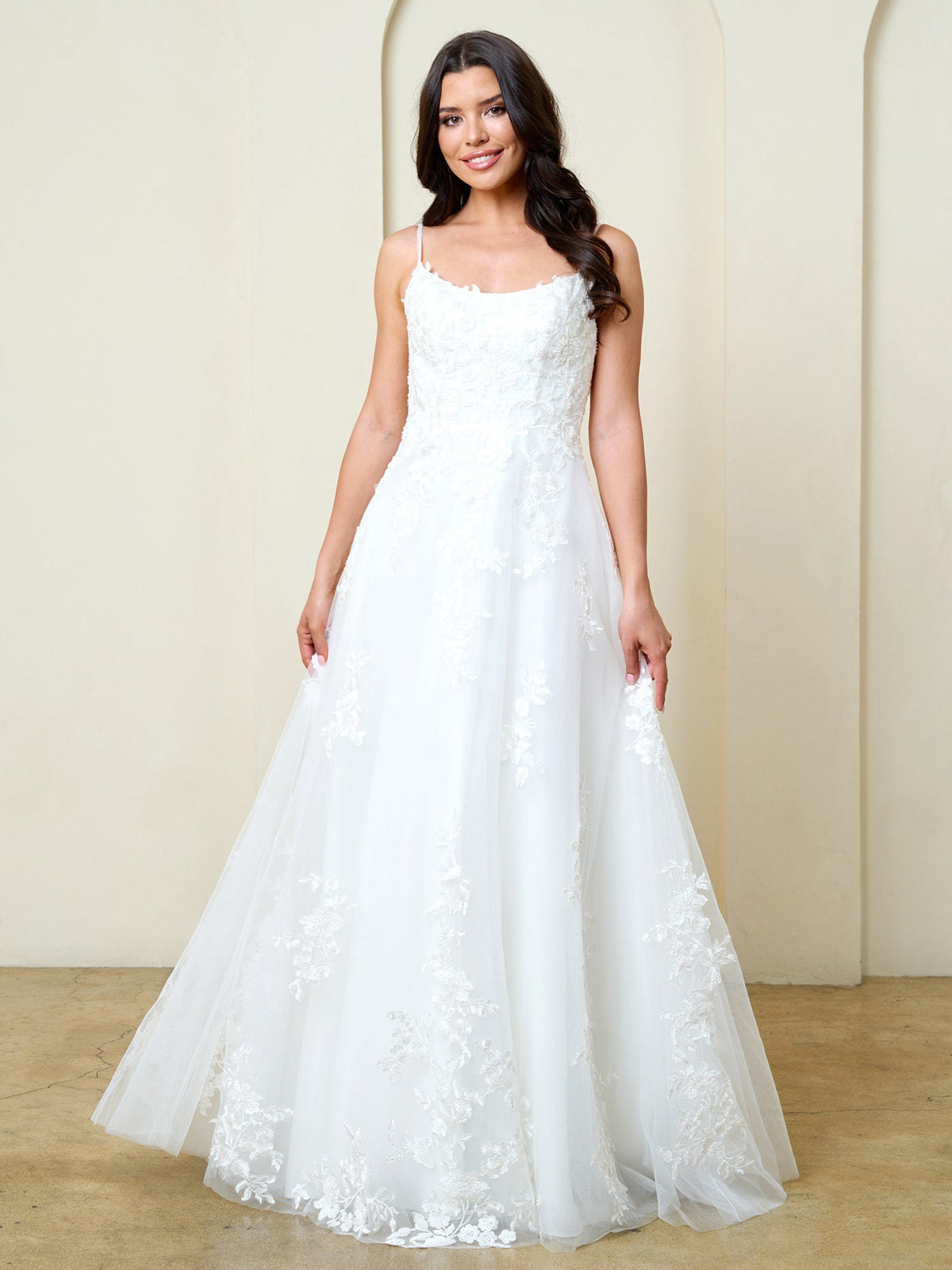 Eva USA Off White Luxurious tulle with dimensional floral lace applique Classic A-line design that enhances natural curves...