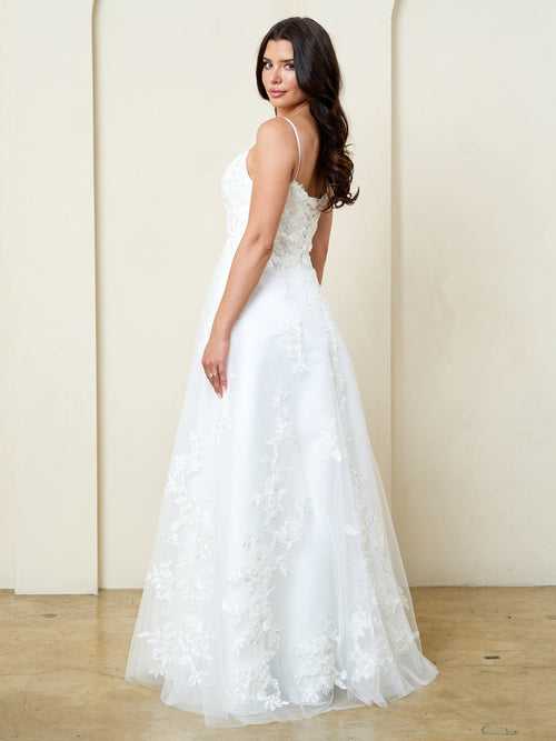 Eva USA Off White Luxurious tulle with dimensional floral lace applique Classic A-line design that enhances natural curves...