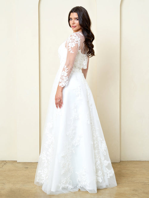 Eva USA Off White Luxurious tulle with dimensional floral lace applique Classic A-line design that enhances natural curves...