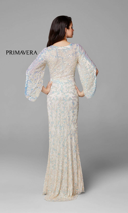A woman faces away from the camera in a Long Bell Sleeve Beaded Evening Gown 9713 with a fitted waist, floor-length silhouette, and sheer beadwork. "Primavera" appears to the left against a plain gray background.
