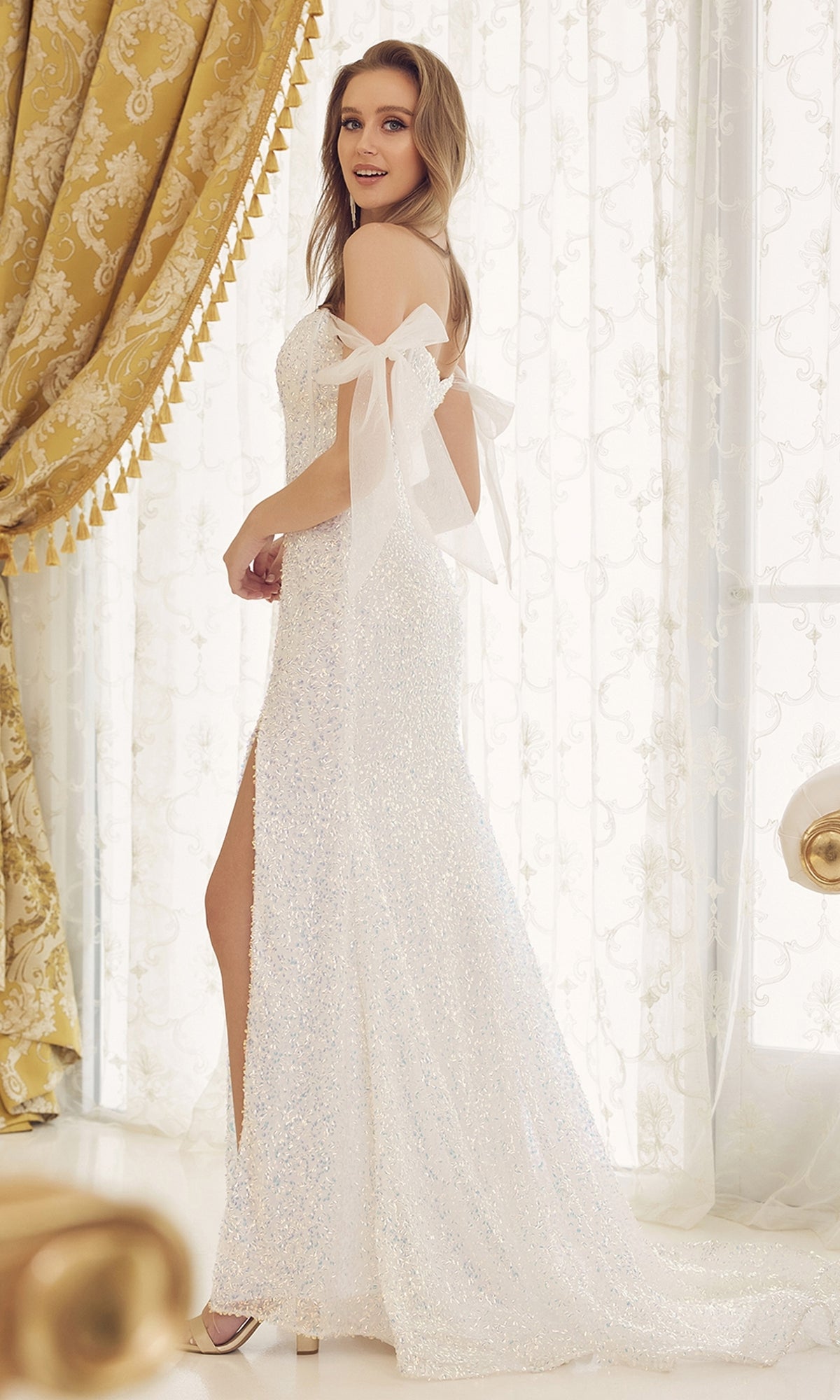 Long White Sequin Formal Gown with Statement Bow Sleeves