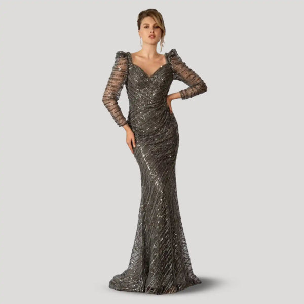 Elegant floor-length sequined evening gown with long mesh sleeves and a sweetheart neckline.