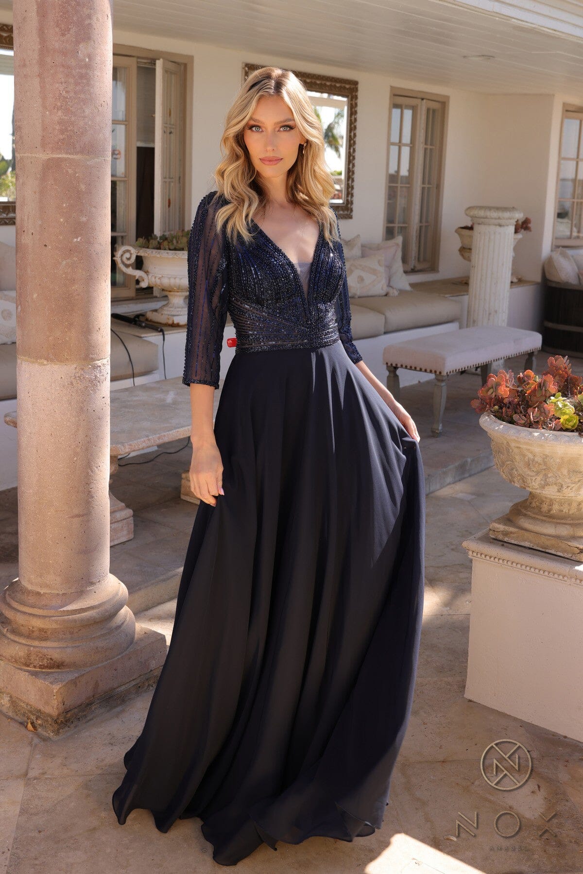 Elegante vestido evasé con mangas 3/4 y adornos | Nox Anabel MF101