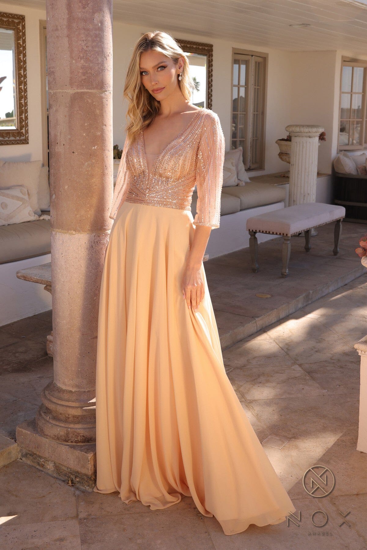 Elegante vestido evasé con mangas 3/4 y adornos | Nox Anabel MF101