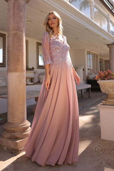 Hermoso vestido Nox Anabel MF100 con escote en A y mangas 3/4 con lentejuelas