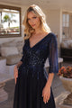 Hermoso vestido Nox Anabel MF100 con escote en A y mangas 3/4 con lentejuelas