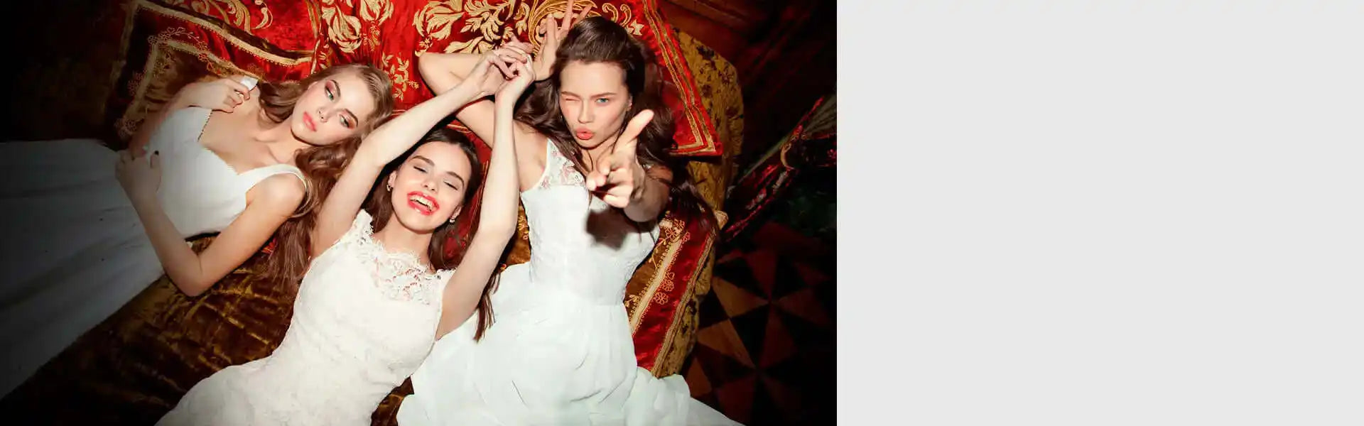 Three women in white dresses.